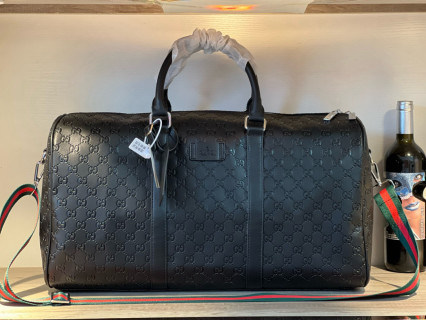 Gucci Black Monogram Embossed Travel Duffel Bag view 1