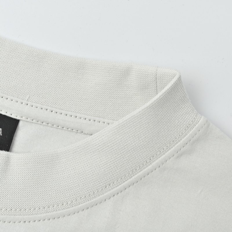 Essentials White T-Shirt with Green Graphic Print view