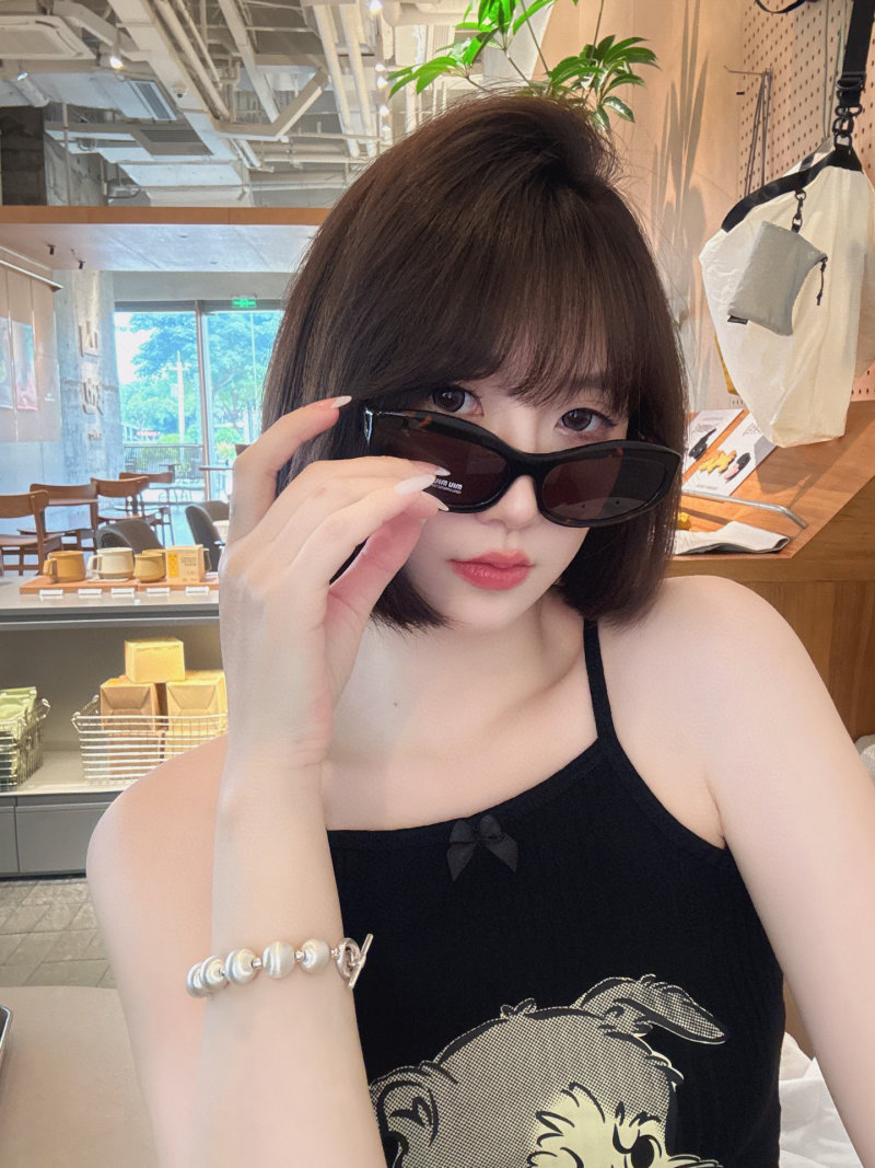 Miu Miu White Oval Sunglasses SMU 108Z view