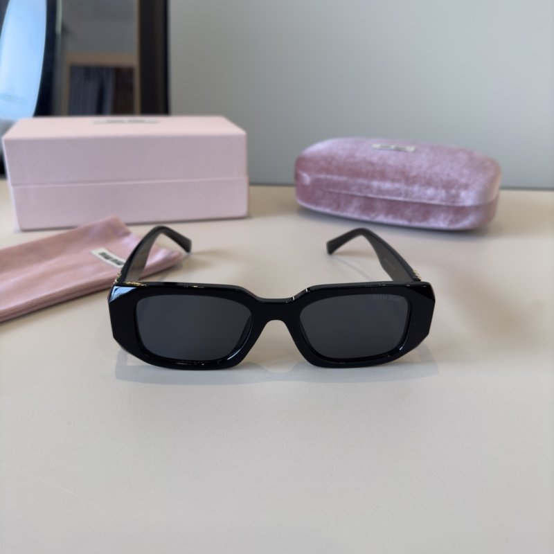 Miu Miu Black Oval Sunglasses with Metal Logo Detail view
