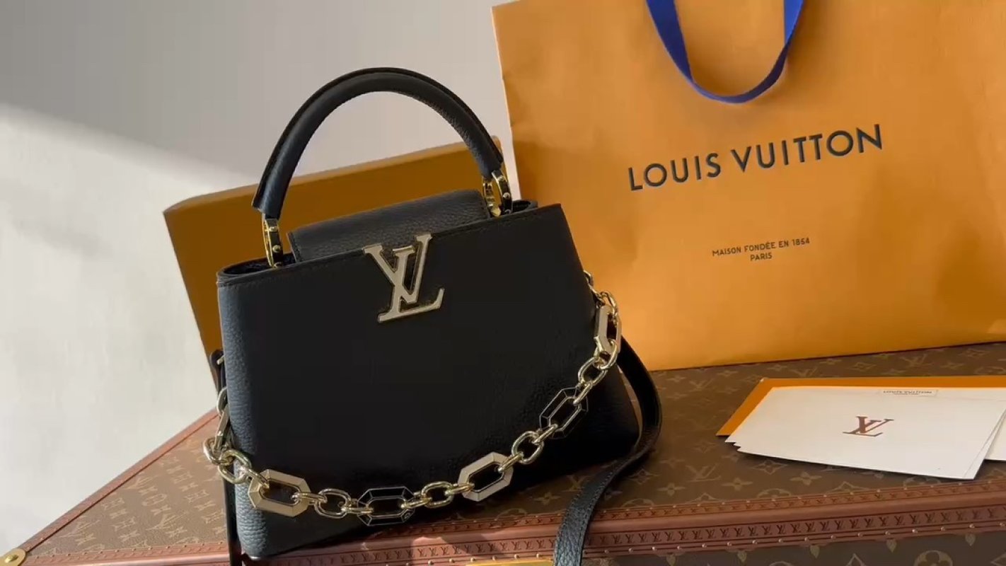 Louis Vuitton Capucines Black Leather Handbag with Chain Detail