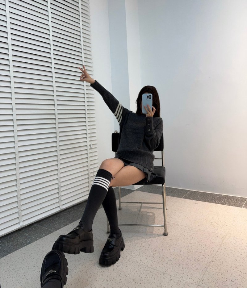 Black Knit Sweater with Striped Sleeves