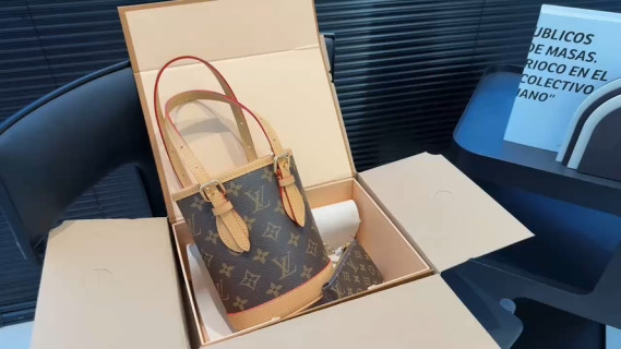 Louis Vuitton Monogram Canvas Bucket Bag with Red Handles video