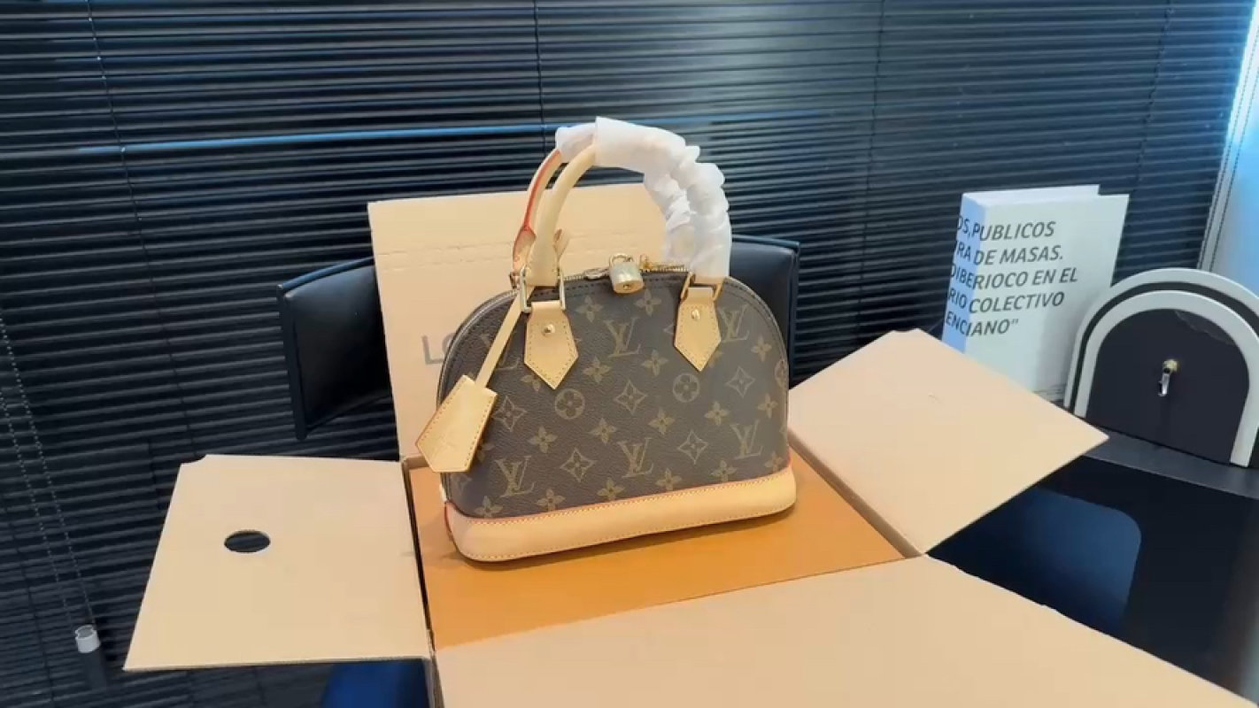 Louis Vuitton Monogram Alma Handbag Brown Tan