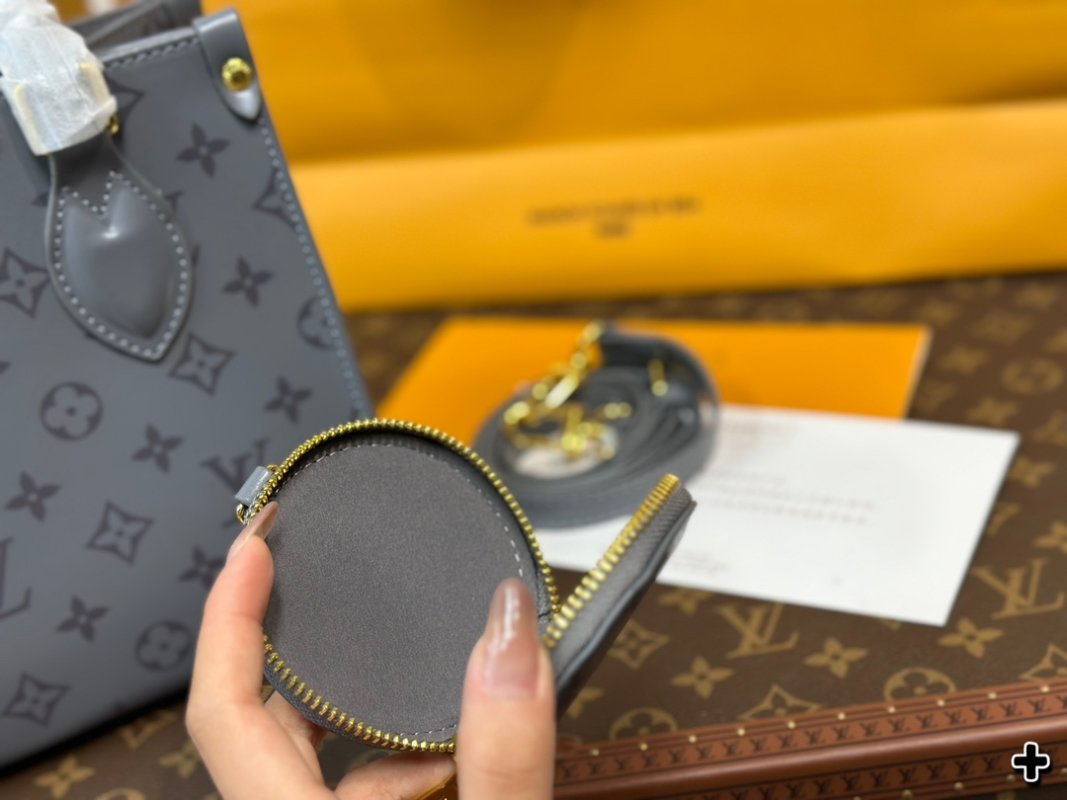 Louis Vuitton On The Go Medium Monogram Empreinte Grey Handbag view