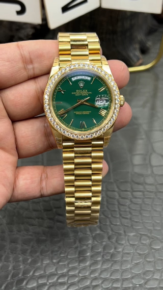 Rolex Day-Date 40mm Green Dial Gold Watch with Diamond Bezel video