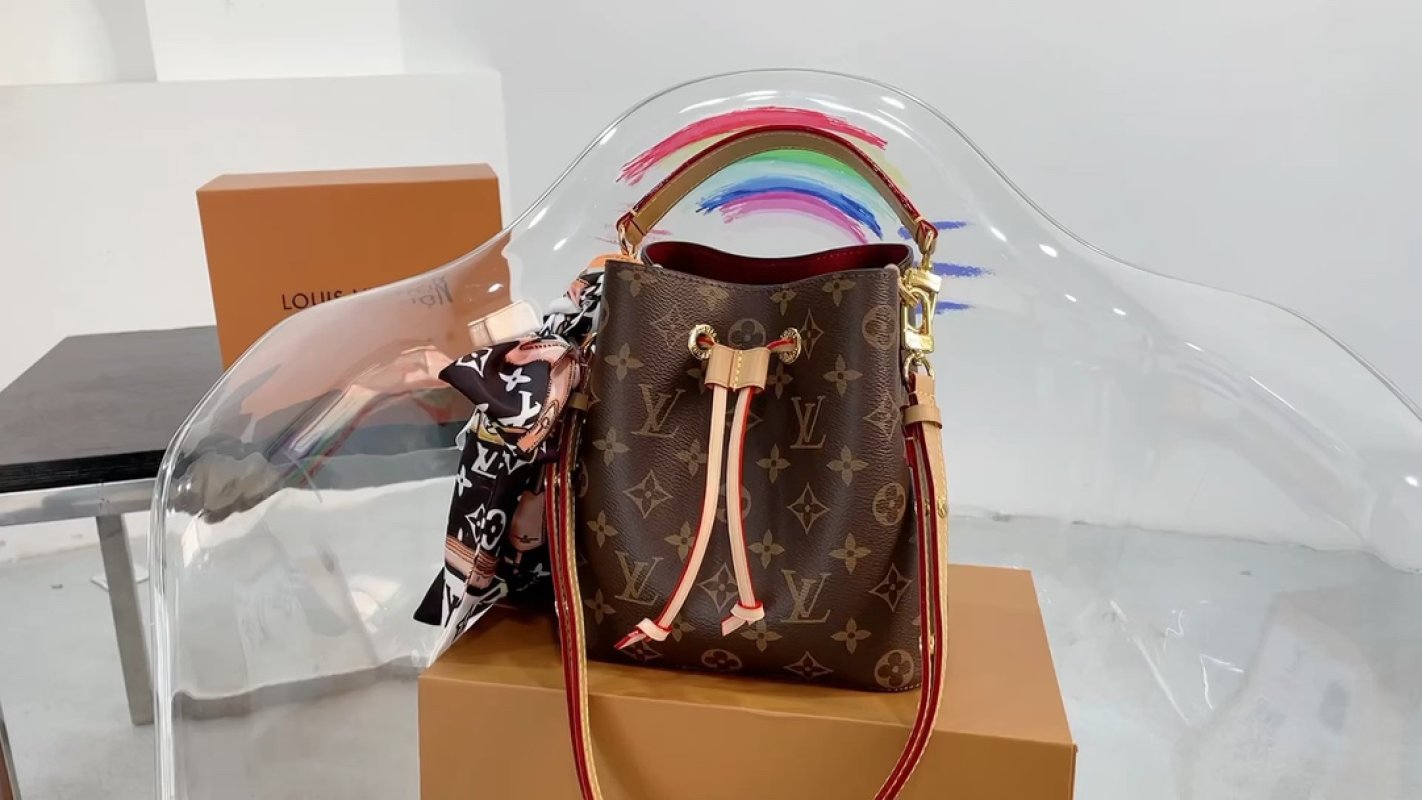 Louis Vuitton Monogram Bucket Bag with Red Accents