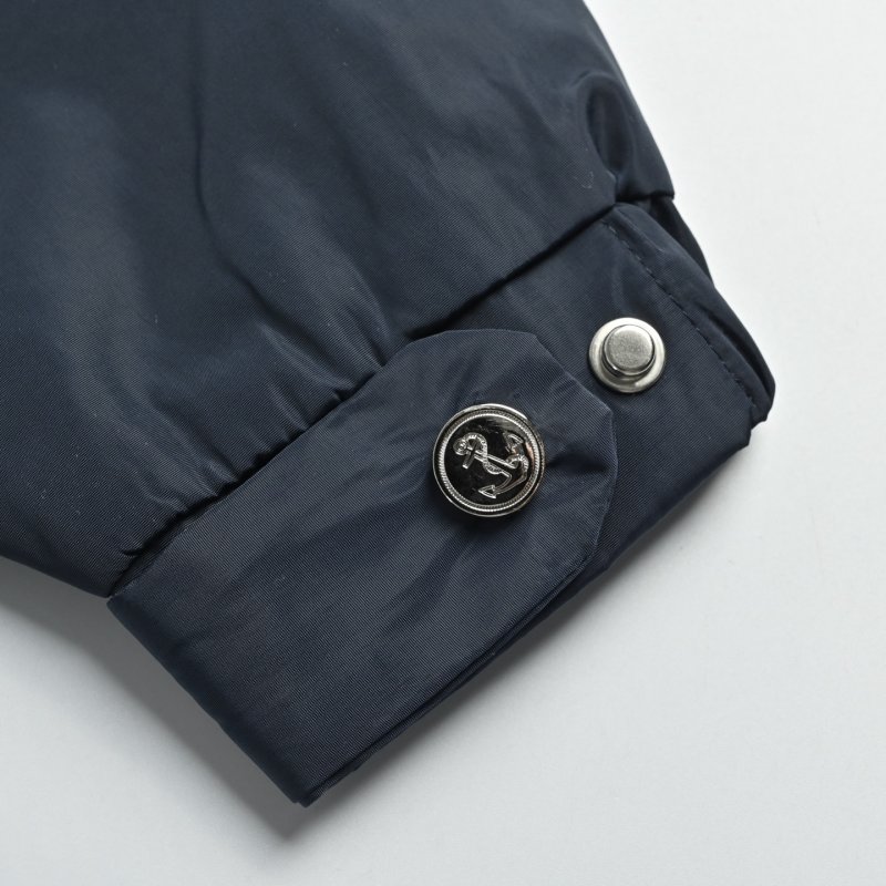 Navy Puffer Jacket with Striped Cuff Detail view