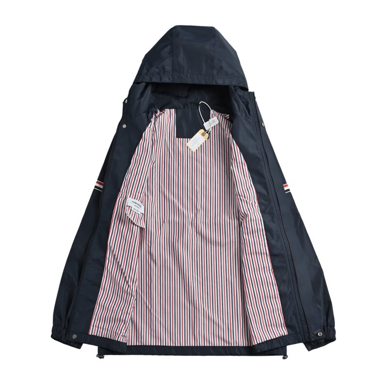 Navy Puffer Jacket with Striped Cuff Detail view
