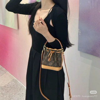 Louis Vuitton Monogram Canvas Bucket Bag with Tan Leather Trim view 2