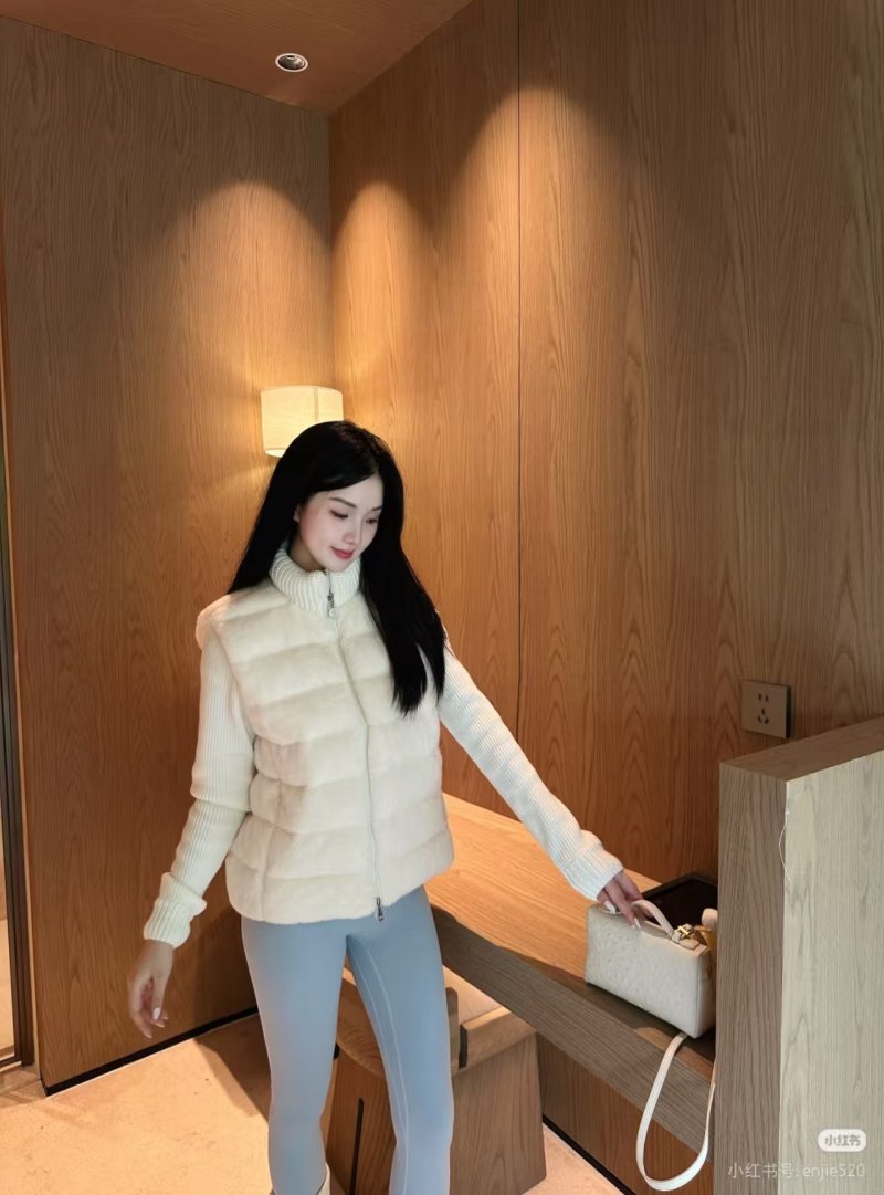Cream Puffer Vest with Ribbed Knit Sleeves view