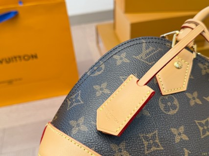 Louis Vuitton Shell Bag Monogram Canvas Honey Yellow view 7