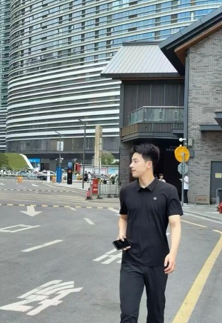 Black Minimalist Polo Shirt with Embroidered Logo view 2