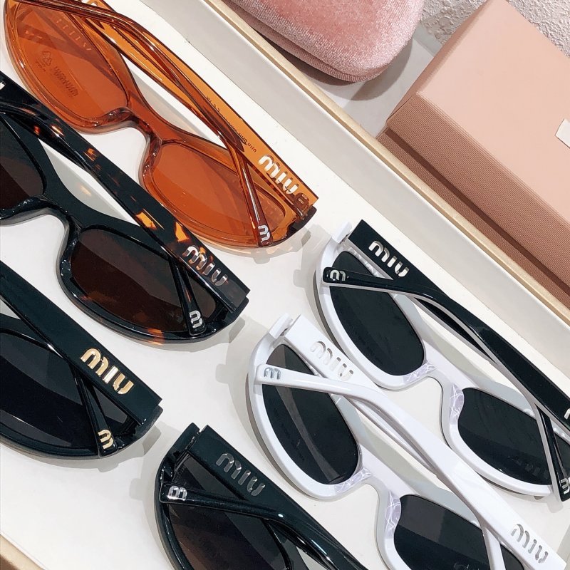 Miu Miu SMU 108Z Black Oval Sunglasses view