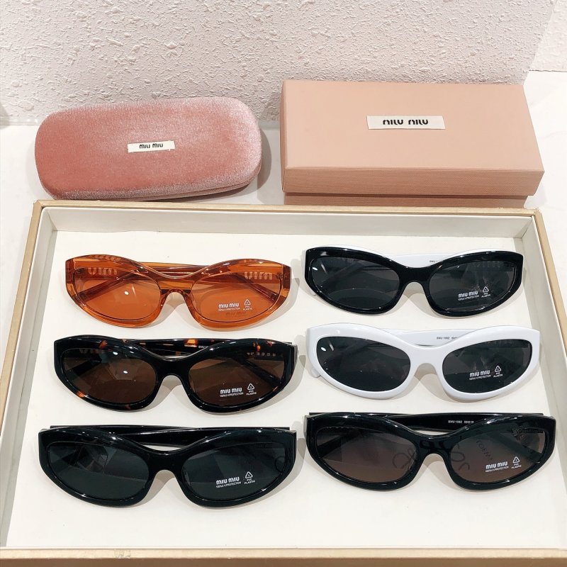 Miu Miu SMU 108Z Black Oval Sunglasses view