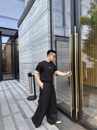 Loewe Black Wide-Leg Anagram Embroidered Pants view 9