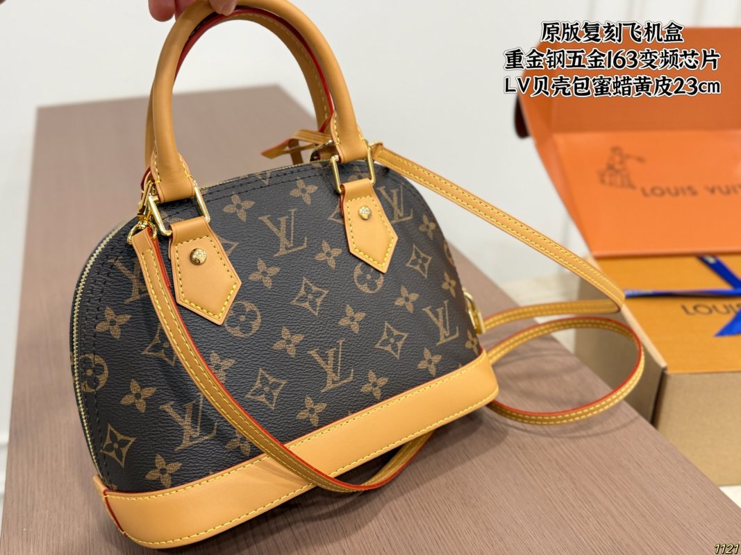 Louis Vuitton Shell Bag Monogram Canvas Honey Yellow 23cm view