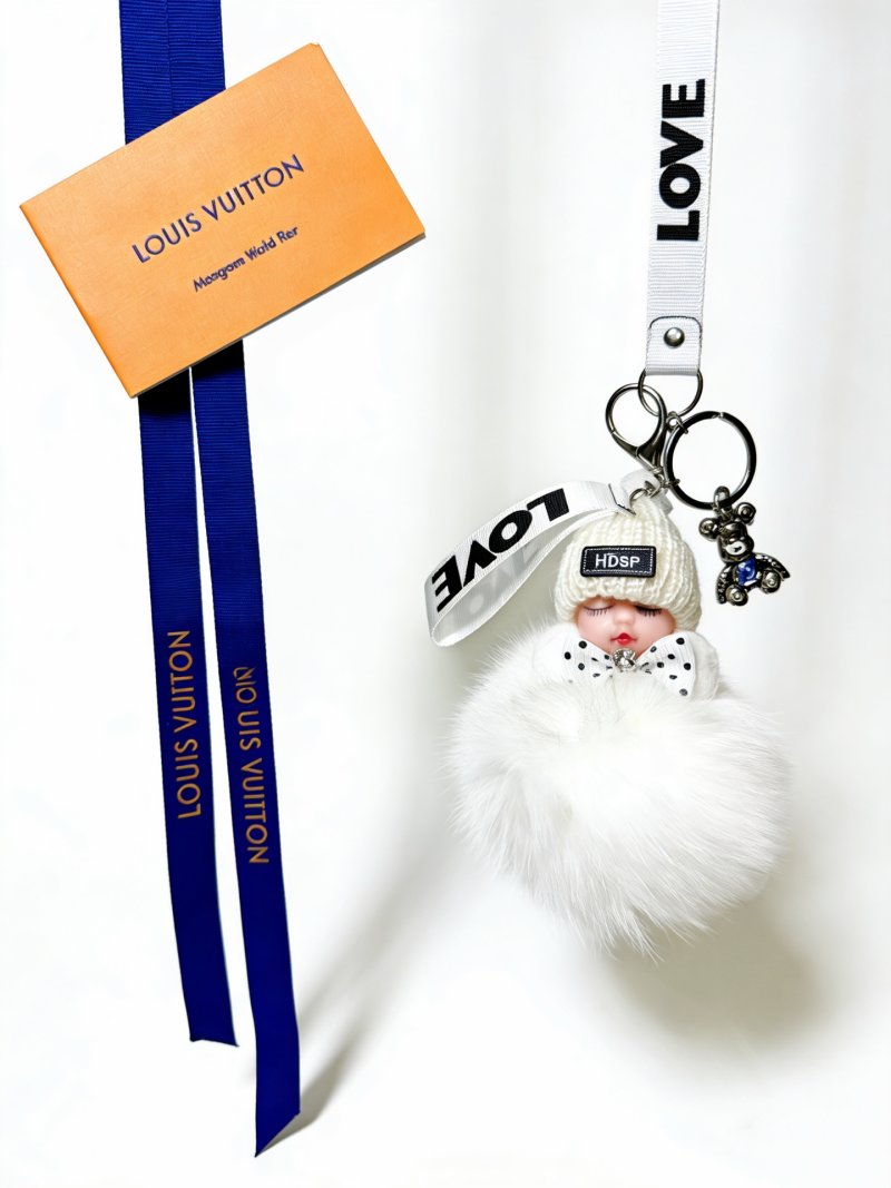 Louis Vuitton Anger Forest Doll Keychain with Fur Pom – White/Navy