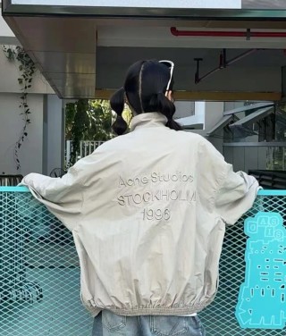 Beige Oversized Windbreaker Jacket with Embroidered Sleeve Detail view 9