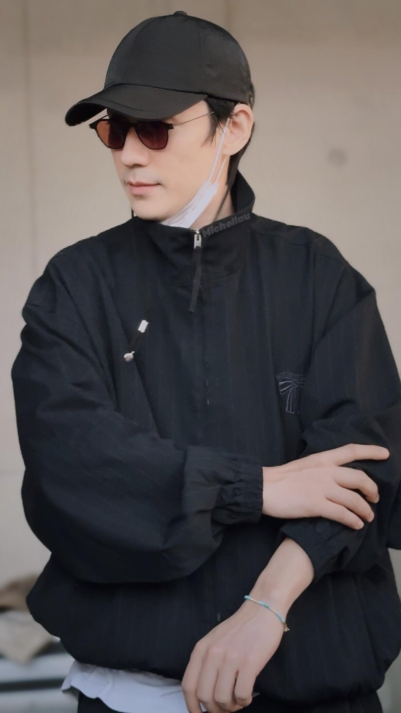 Black Oversized Puffer Jacket with Embroidered Detail view