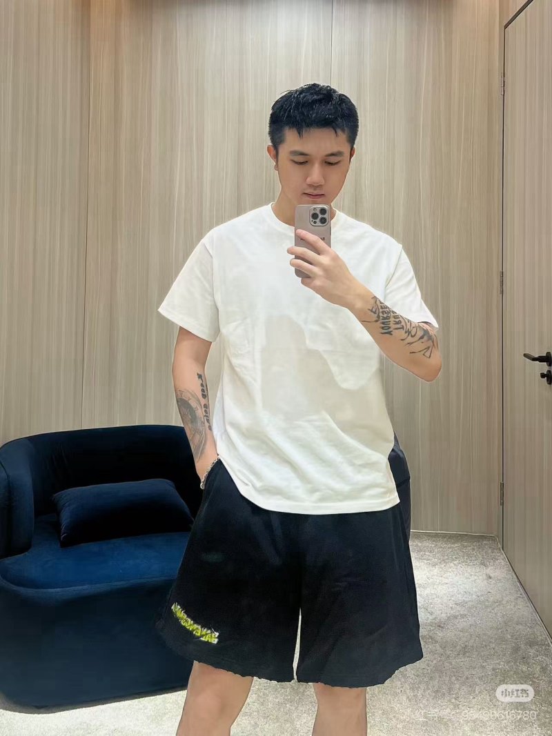 Black Graphic Shorts with Yellow Print Detail view