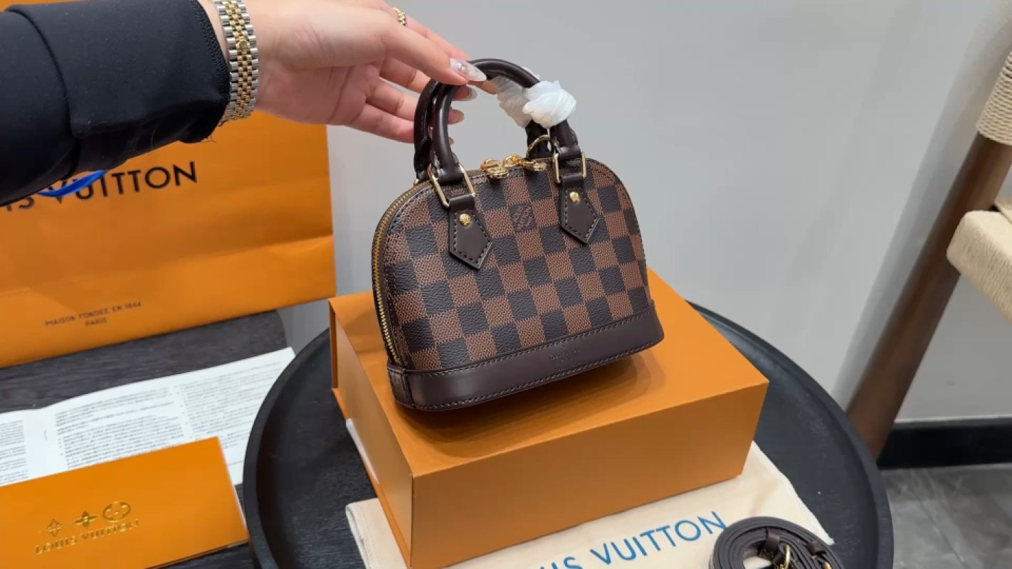 Louis Vuitton Damier Ebene Alma BB Handbag Brown