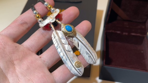 Silver & Gold Eagle Feather Pendant Necklace with Blue Stone