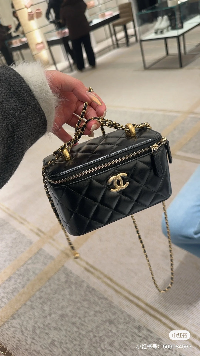 Chanel Quilted Black Camera Bag with Gold Chain Strap