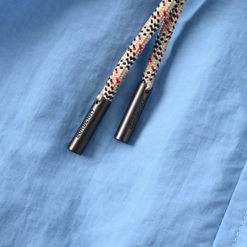 Sky Blue Nylon Shorts with Checkered Tape Detail view