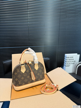 Louis Vuitton Alma Monogram Canvas Handbag