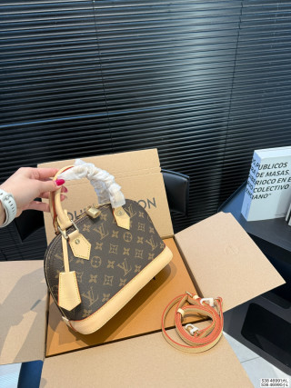 Louis Vuitton Alma Monogram Canvas Handbag view 2