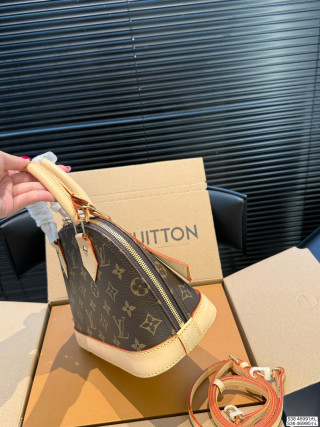 Louis Vuitton Alma Monogram Canvas Handbag view 5