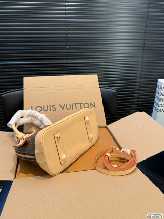 Louis Vuitton Alma Monogram Canvas Handbag view 7
