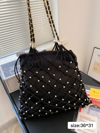Chanel Coco Beach Pearl Grid Bucket Bag Black view 2