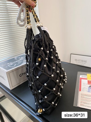 Chanel Coco Beach Pearl Grid Bucket Bag Black view 3