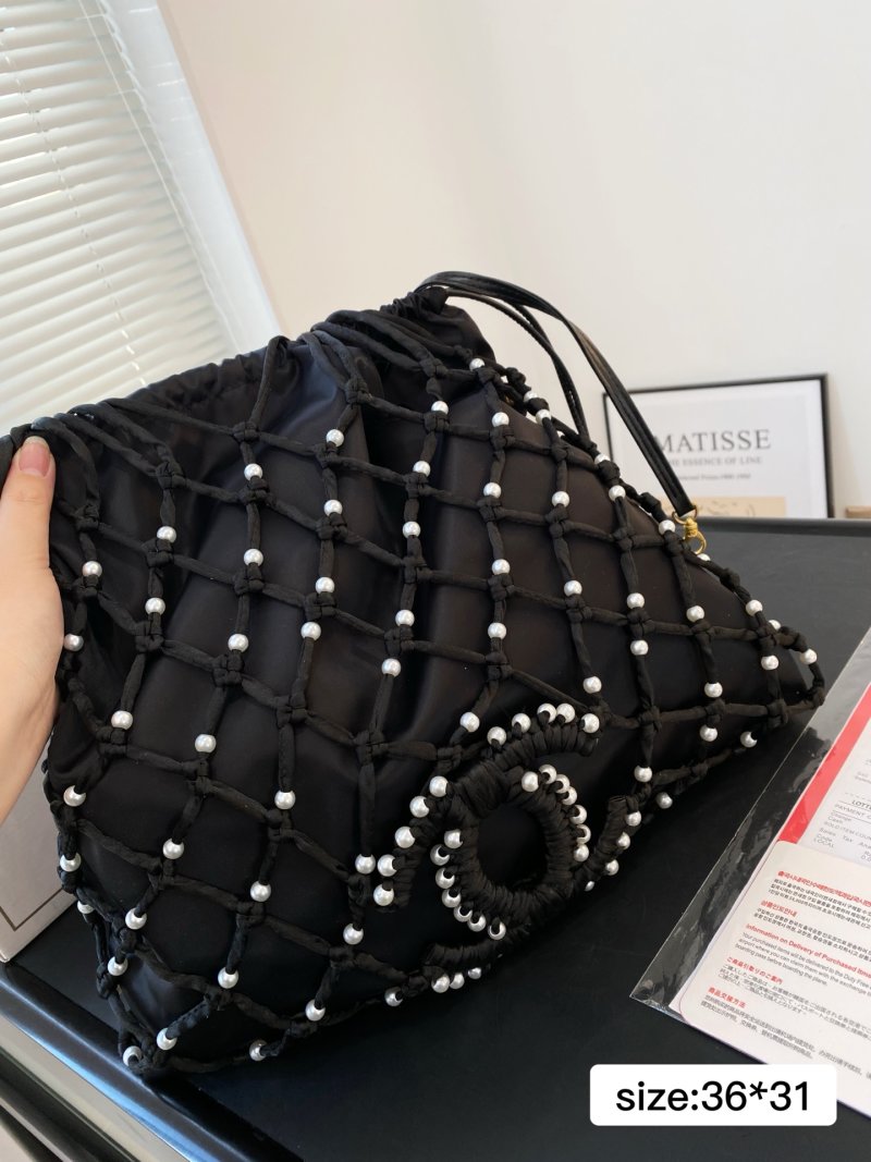 Chanel Coco Beach Pearl Grid Bucket Bag Black view