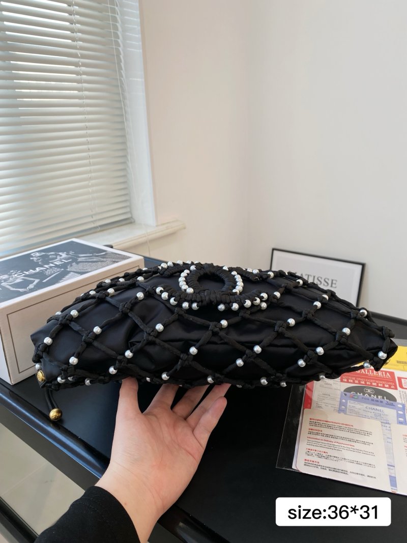 Chanel Coco Beach Pearl Grid Bucket Bag Black view
