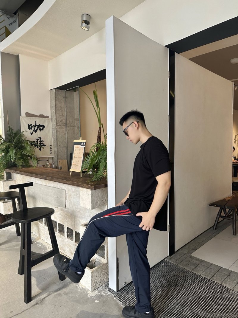 Alo Navy Track Pants with Red Stripe view