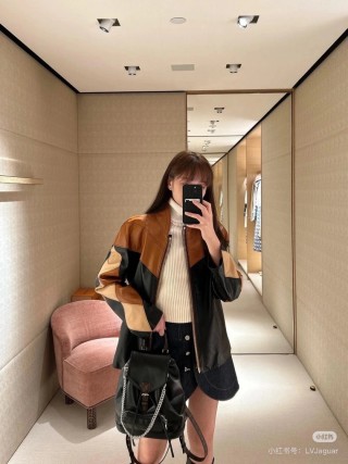 Louis Vuitton Black Leather Backpack with Chain Detail view 7