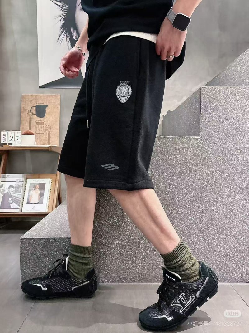 Essentials Black Shorts with Emblem Badge