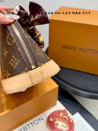 Louis Vuitton Alma Monogram Canvas Handbag Brown view 4