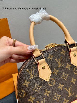 Louis Vuitton Alma Monogram Canvas Handbag Brown view 5