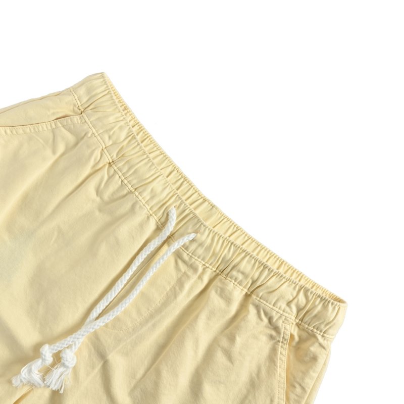 Yellow Drawstring Shorts with White Graphic Tee Set view