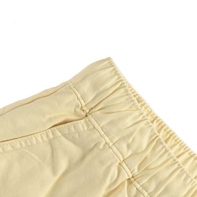Yellow Drawstring Shorts with White Graphic Tee Set view