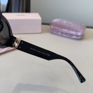 Miu Miu Black Oval Sunglasses with Gold Accent view 6