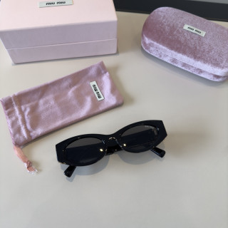 Miu Miu Black Oval Sunglasses with Gold Accent view 10
