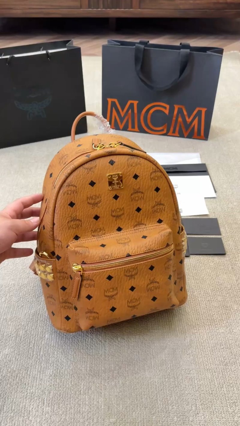 MCM Cognac Monogram Backpack with Gold Hardware