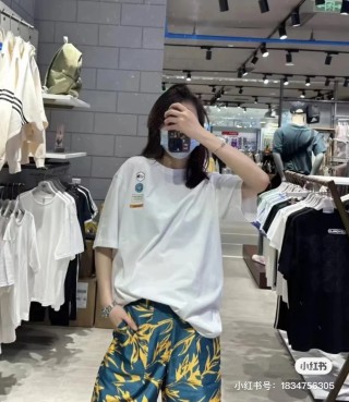 White Oversized T-Shirt with Minimalist Badge