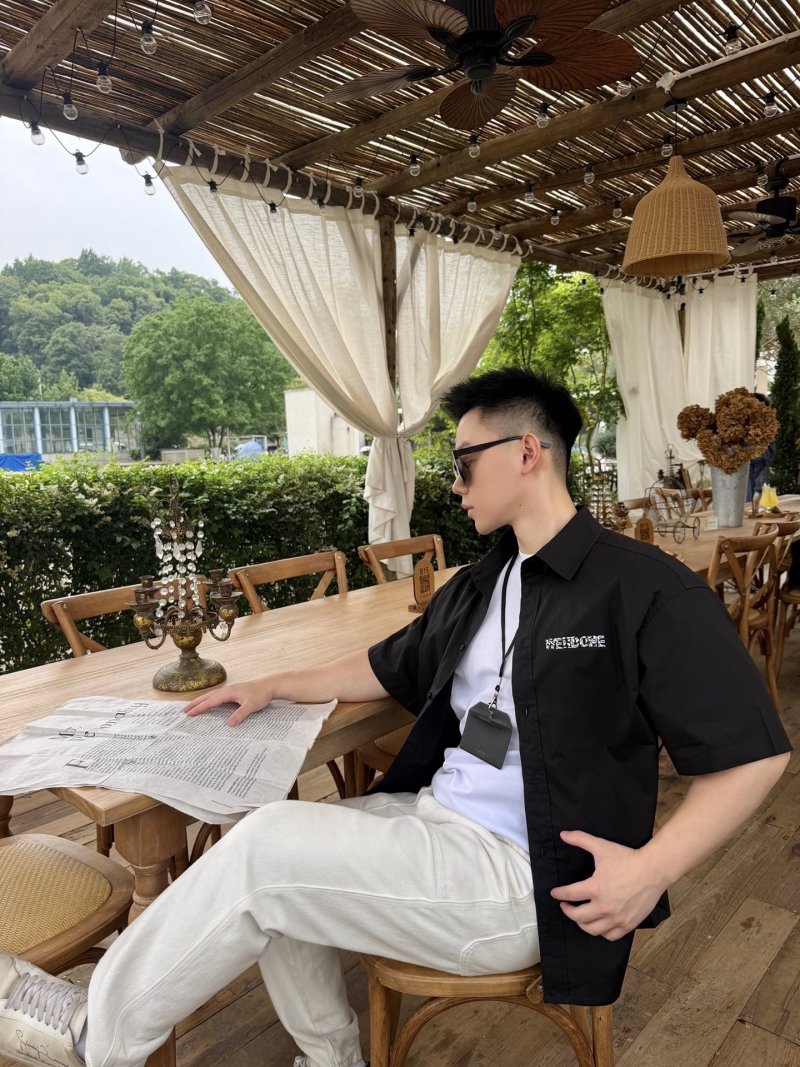 Black Short Sleeve Button-Up Shirt with Chest Graphic view
