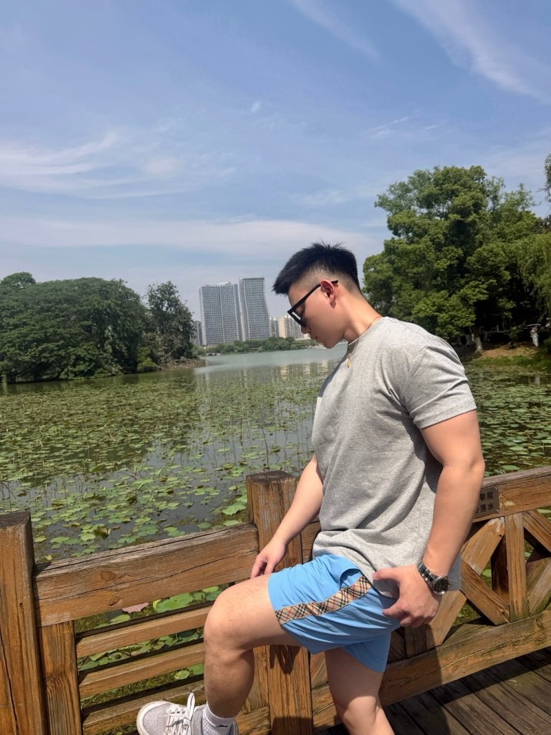 Sky Blue Nylon Shorts with Checkered Tape Detail view